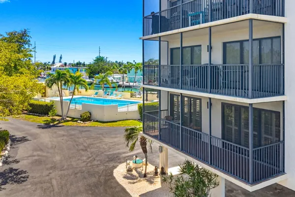 an aerial view of a house with outdoor space