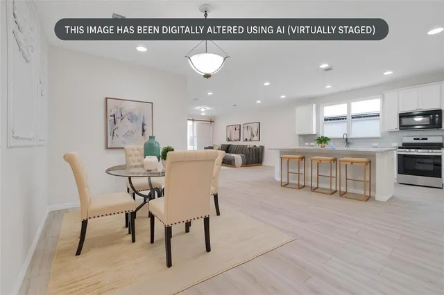 a view of a dining room with furniture
