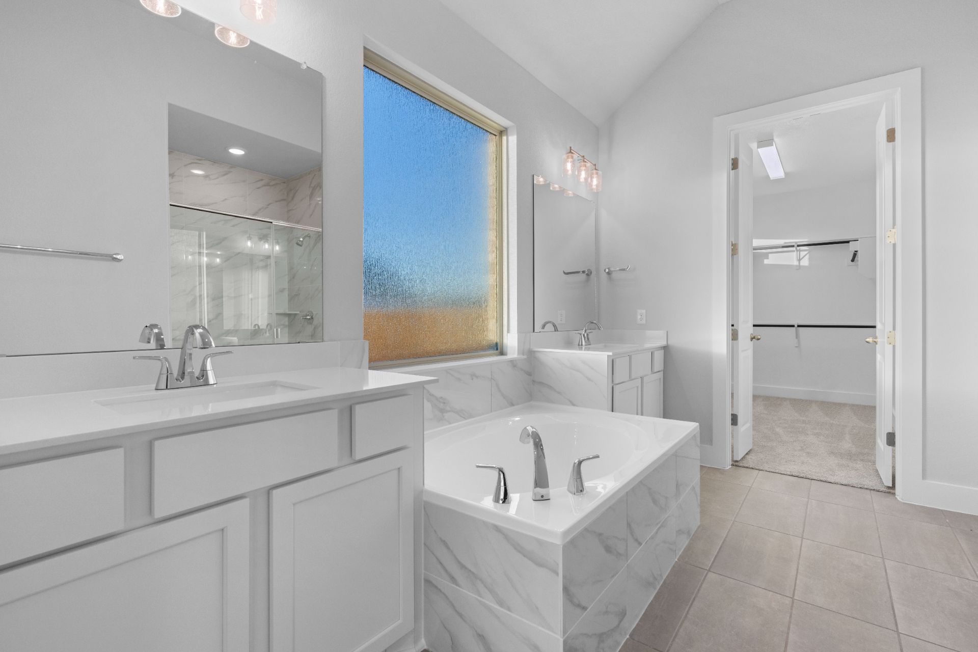 17421 Graces Path Pflugerville, TX 78660 - Photo 20 of 38 Primary Bath retreat with dual vanities & garden tub