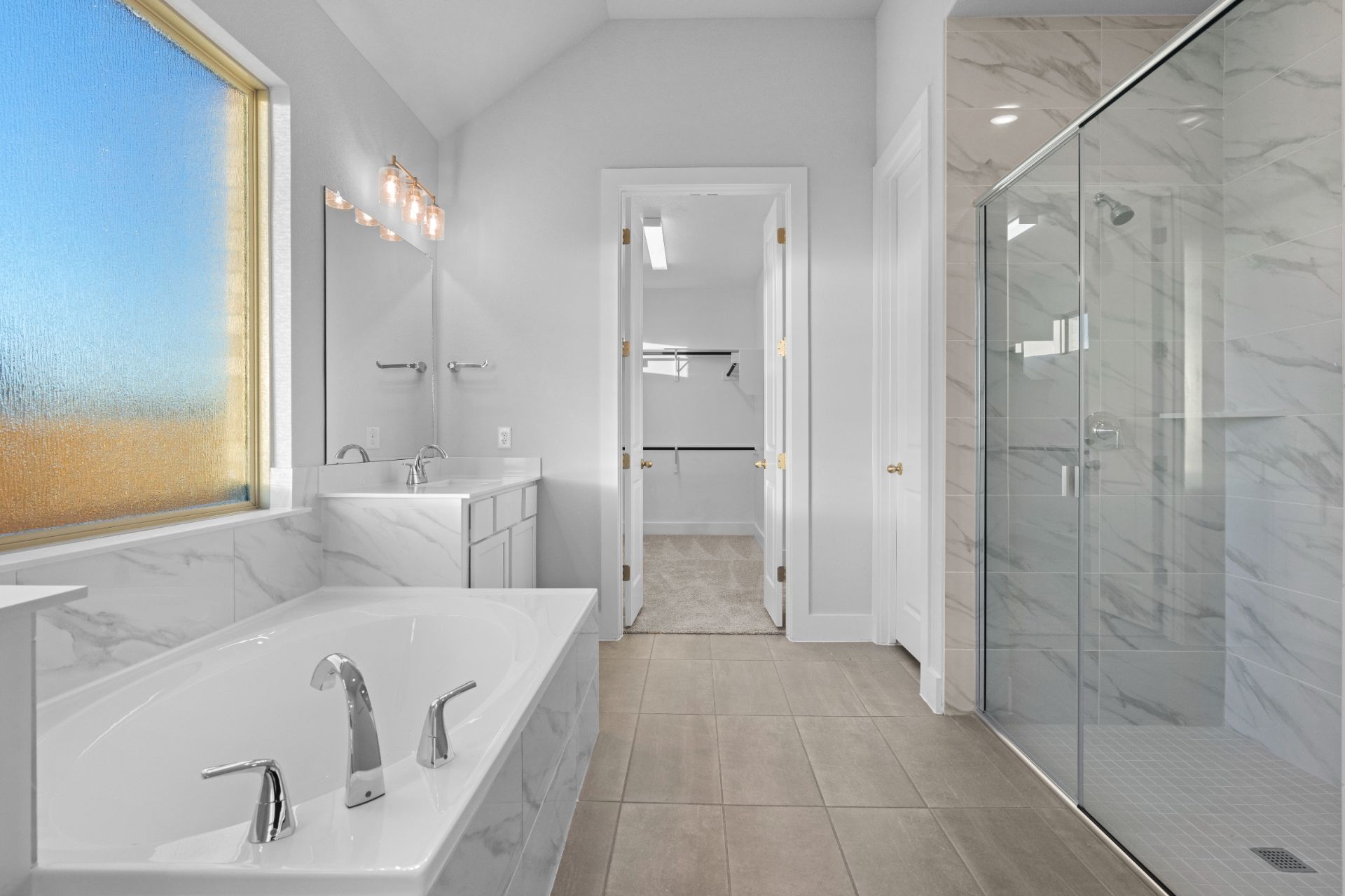 17421 Graces Path Pflugerville, TX 78660 - Photo 21 of 38 Primary Bath retreat with dual vanities, garden tub & walk-in shower