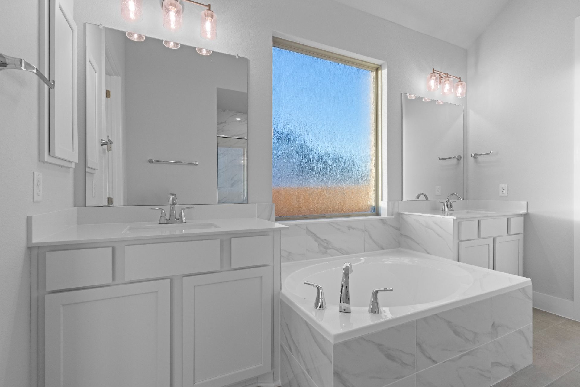 17421 Graces Path Pflugerville, TX 78660 - Photo 23 of 38 Primary Bath retreat with dual vanities & garden tub