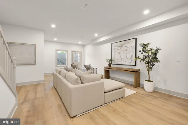 a bedroom with a bed and a mirror