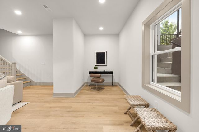 a bathroom with a sink a toilet and a bathtub