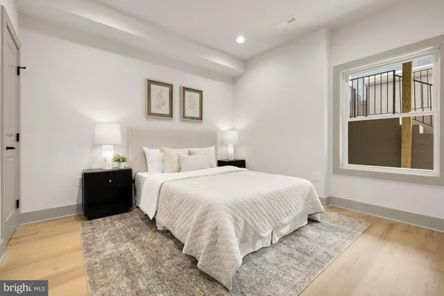 a view of a hallway with washer and dryer