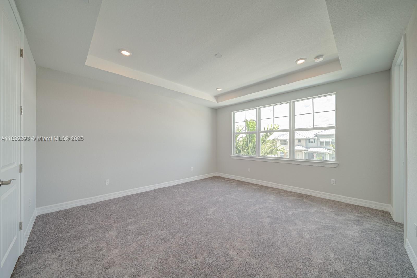 1280 Eucalyptus Drive, Unit 4 Hollywood, FL 33021 - Photo 11 of 36 an empty room with windows