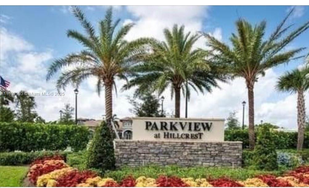 1280 Eucalyptus Drive, Unit 4 Hollywood, FL 33021 - Photo 2 of 36 a view of a palm and palm trees