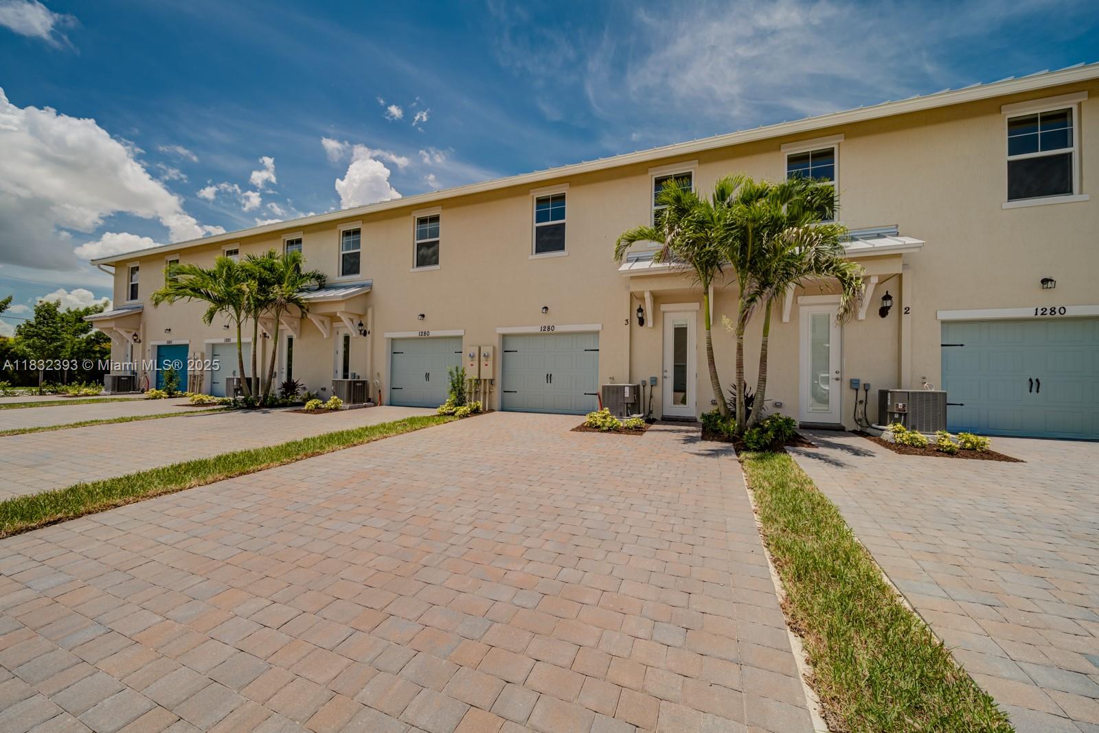 1280 Eucalyptus Drive, Unit 4 Hollywood, FL 33021 - Photo 34 of 36 a view of a house with a yard