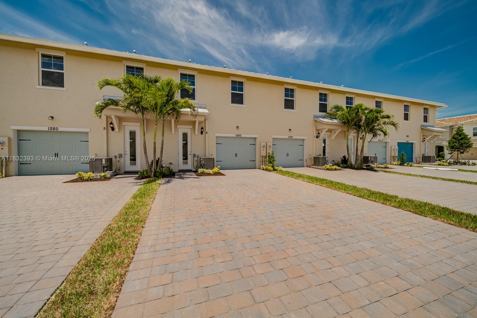 1280 Eucalyptus Drive, Unit 4 Hollywood, FL 33021 - Photo 35 of 36 a front view of a house with a yard