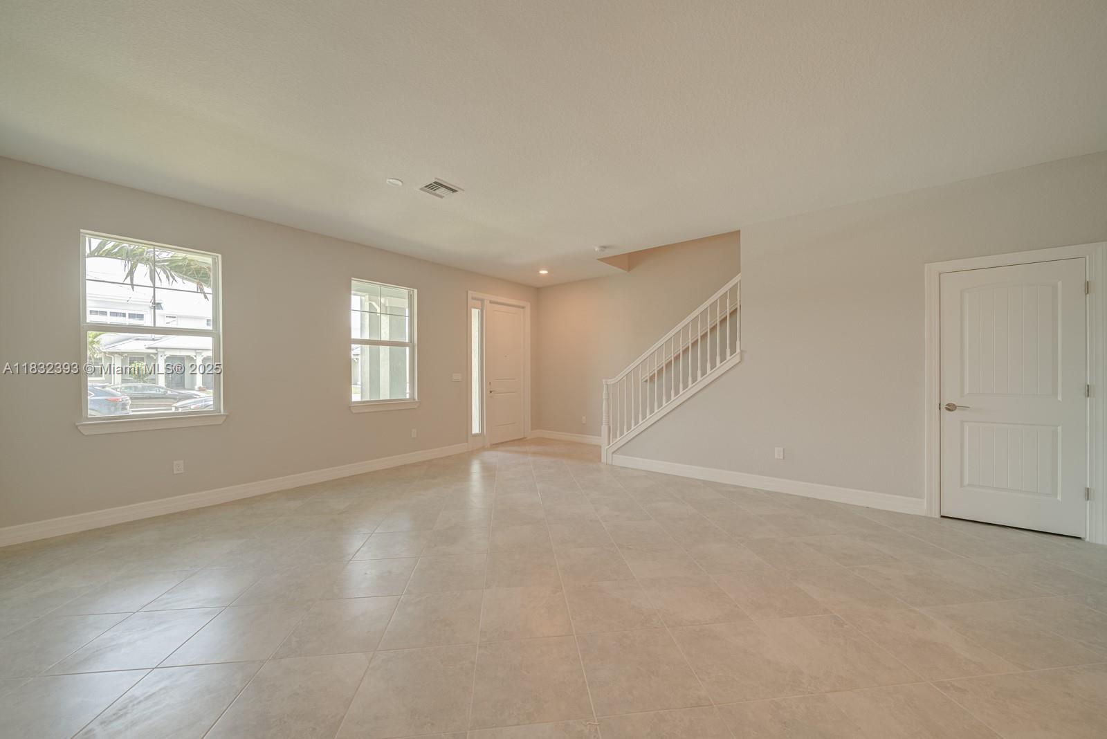 1280 Eucalyptus Drive, Unit 4 Hollywood, FL 33021 - Photo 9 of 36 a view of an empty room with a window