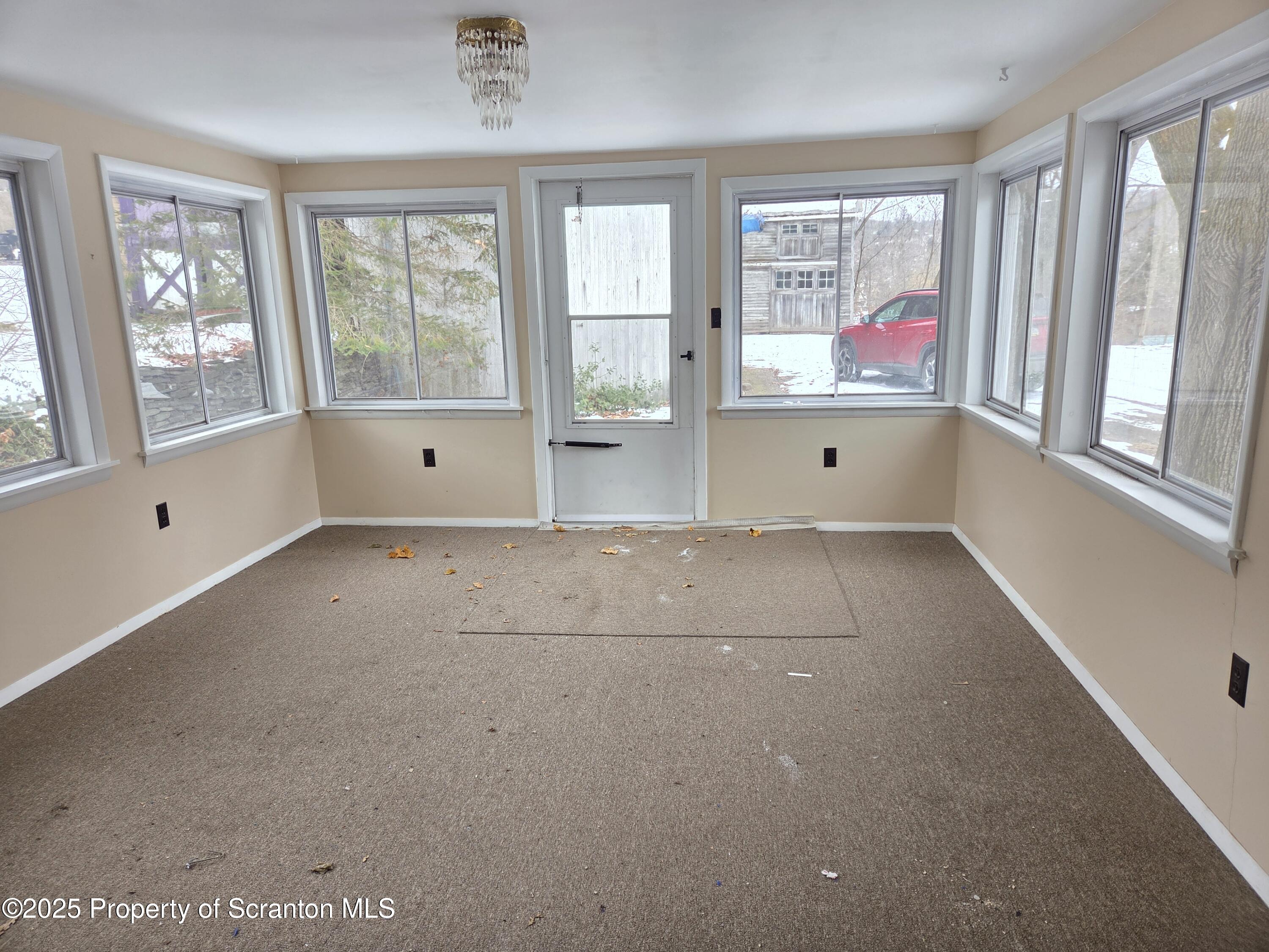5 East Harrison Street Tunkhannock, PA 18657 - Photo 17 of 25 a view of an empty room with window