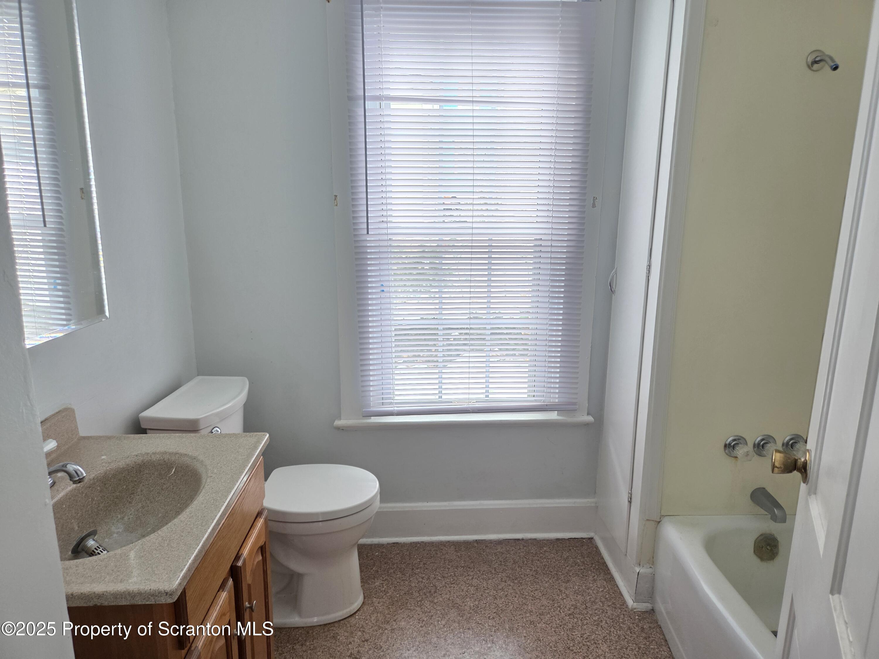 5 East Harrison Street Tunkhannock, PA 18657 - Photo 25 of 25 a bathroom with a sink toilet and shower