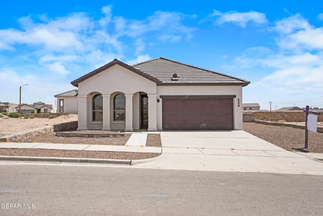 a house view with a outdoor space
