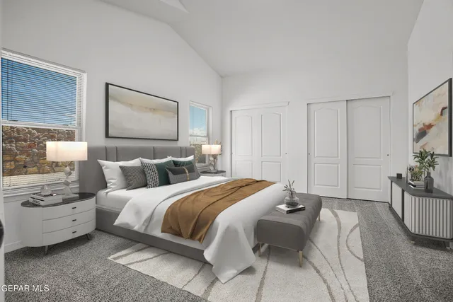 a view of an empty room with closet area