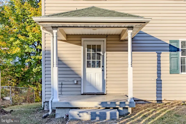 a front view of a house with a garage