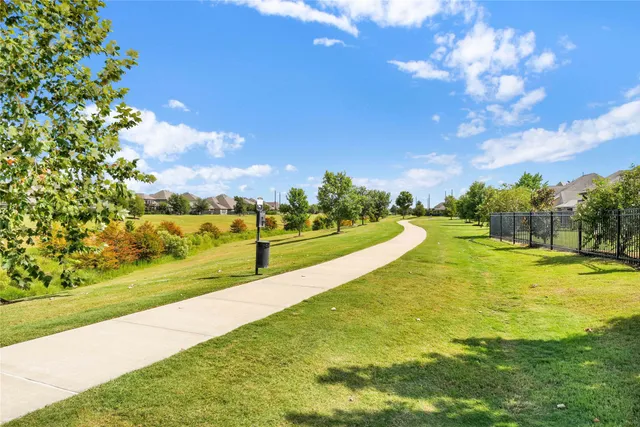 a view of a lake with a big yard