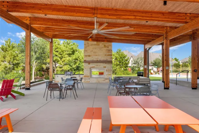 a patio with patio lots of furniture and garden view