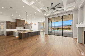 1141 East Lost Ridge Drive Washington, UT 84780 - Photo 31 of 108 Expansive interior with wood-finish flooring, a coffered ceiling with recessed lighting, and a large ceiling fan