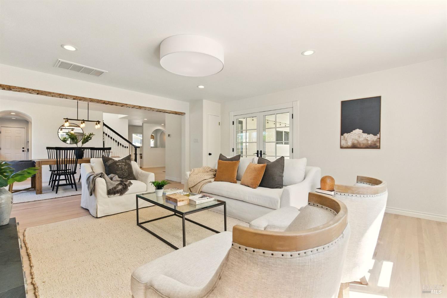 809 Paula Lane Petaluma, CA 94952 - Photo 1 of 1 a living room with furniture and wooden floor