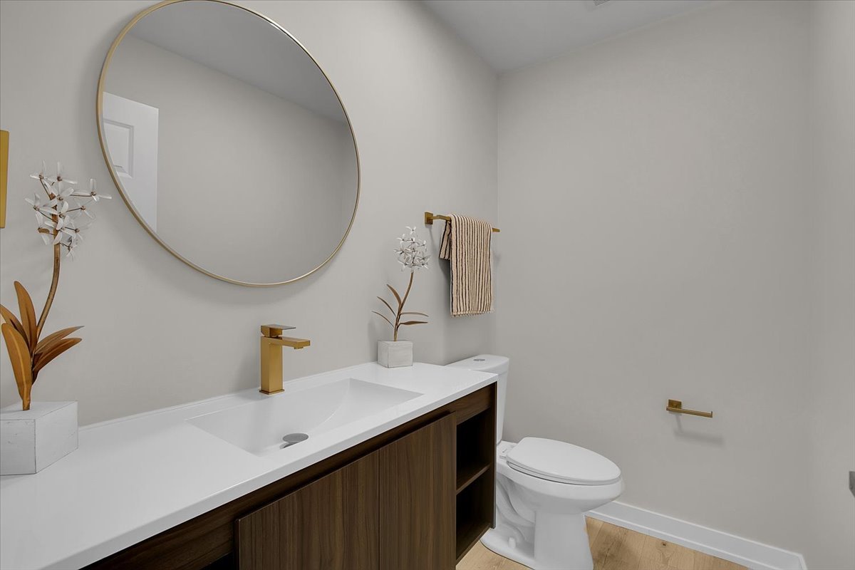 1109 71st Street Darien, IL 60561 - Photo 19 of 41 a bathroom with a sink and a mirror