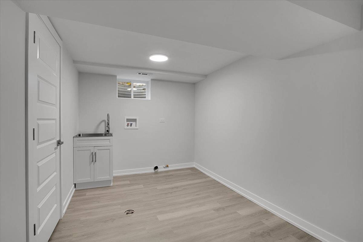 1109 71st Street Darien, IL 60561 - Photo 38 of 41 a view of a kitchen with cabinets