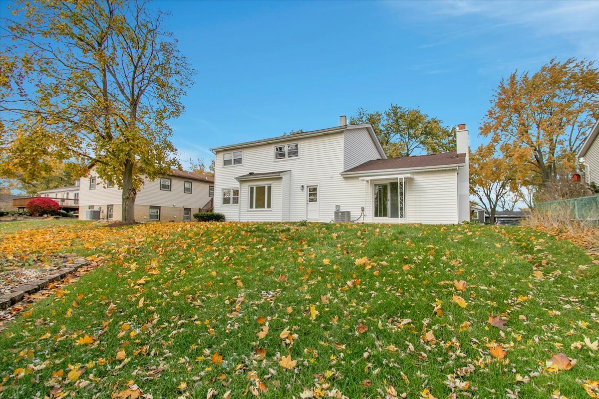 1109 71st Street Darien, IL 60561 - Photo 41 of 41 a front view of a house with a yard