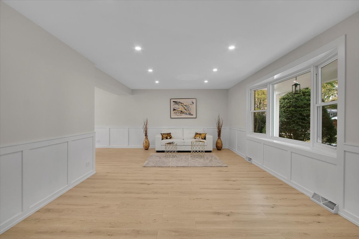 1109 71st Street Darien, IL 60561 - Photo 5 of 41 a view of an empty room with a window