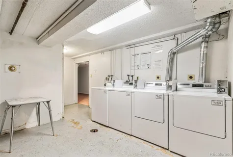 a bathroom with a sink vanity and a mirror