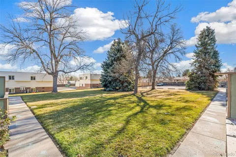 a view of yard with swimming pool