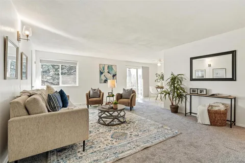 a living room with furniture and a couch