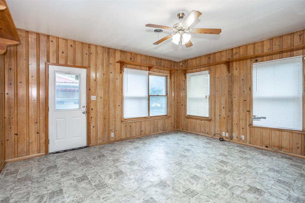 206 Ritchey Street Gainesville, TX 76240 - Photo 14 of 36 a view of an empty room with a window