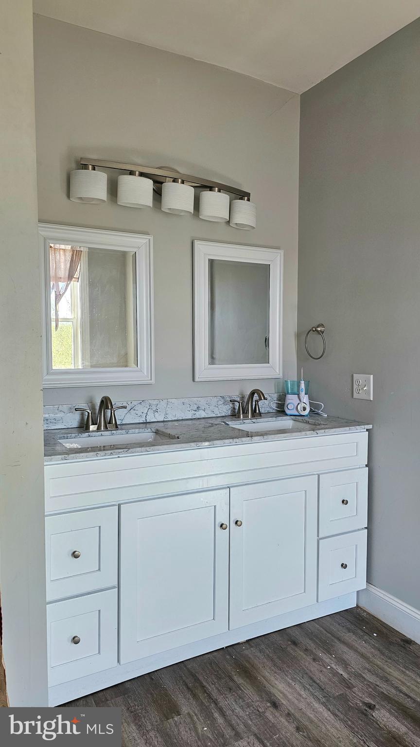 332 Perry Street Columbia, PA 17512 - Photo 18 of 31 a bathroom with a sink and a mirror