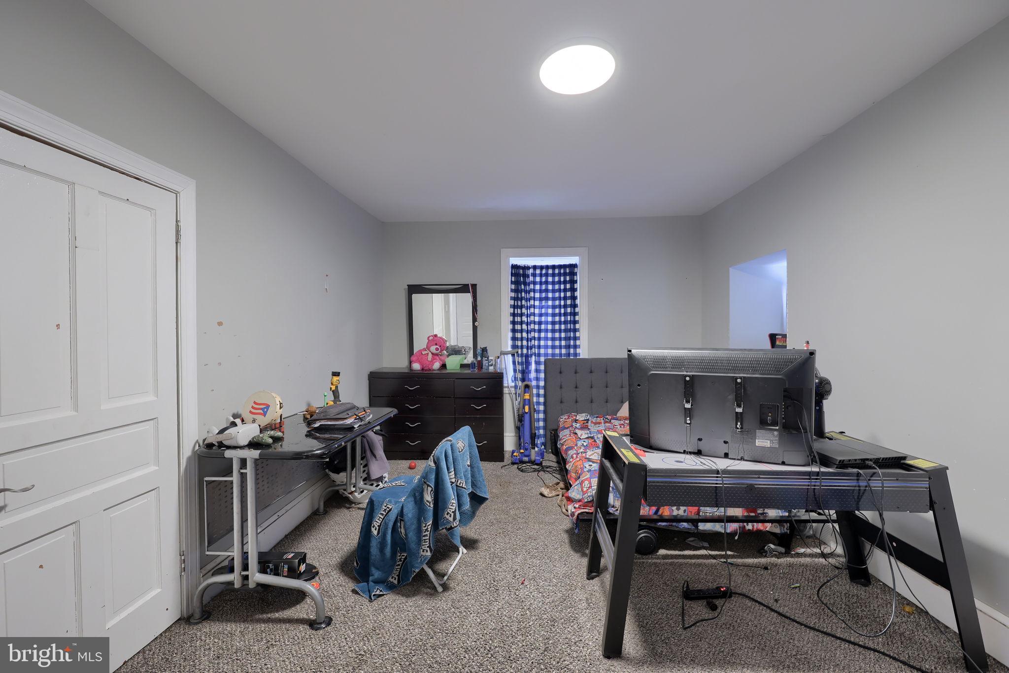 332 Perry Street Columbia, PA 17512 - Photo 19 of 37 a view of a workspace with furniture and a window