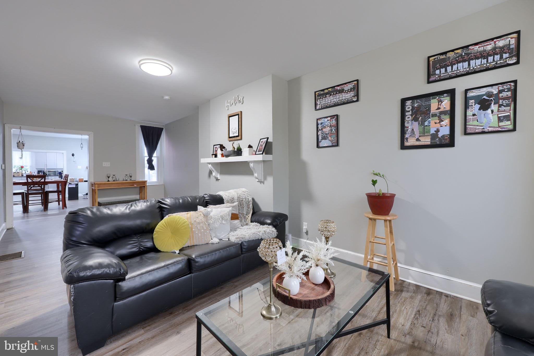 332 Perry Street Columbia, PA 17512 - Photo 2 of 37 a living room with furniture and wooden floor