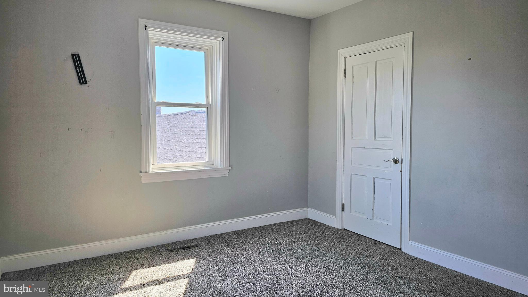 332 Perry Street Columbia, PA 17512 - Photo 22 of 31 a view of an empty room with closet and a window