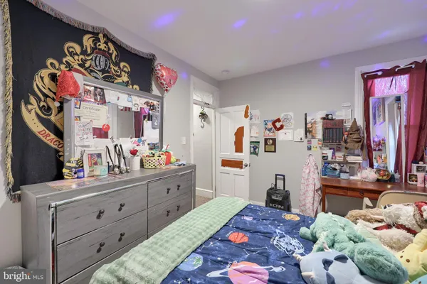 a room with furniture and a bed
