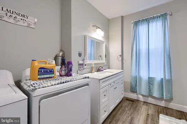 a utility room with washer and dryer