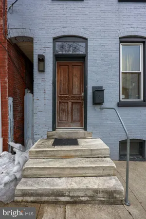 a front view of a house with entryway