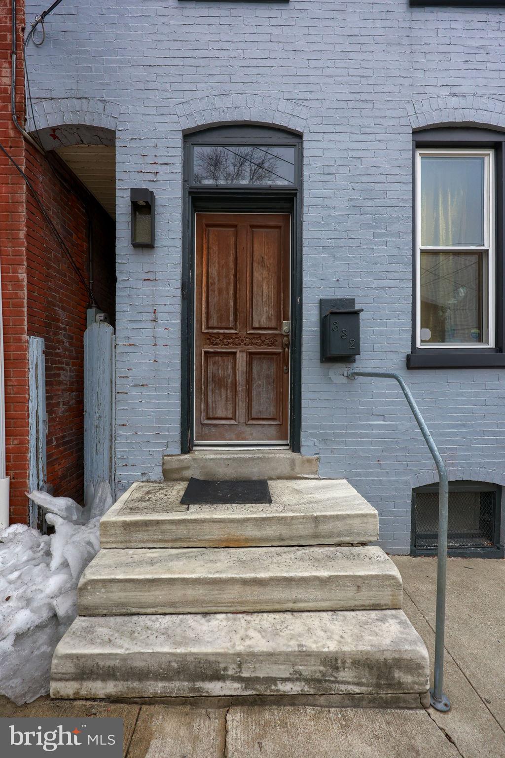 332 Perry Street Columbia, PA 17512 - Photo 30 of 37 a front view of a house with entryway