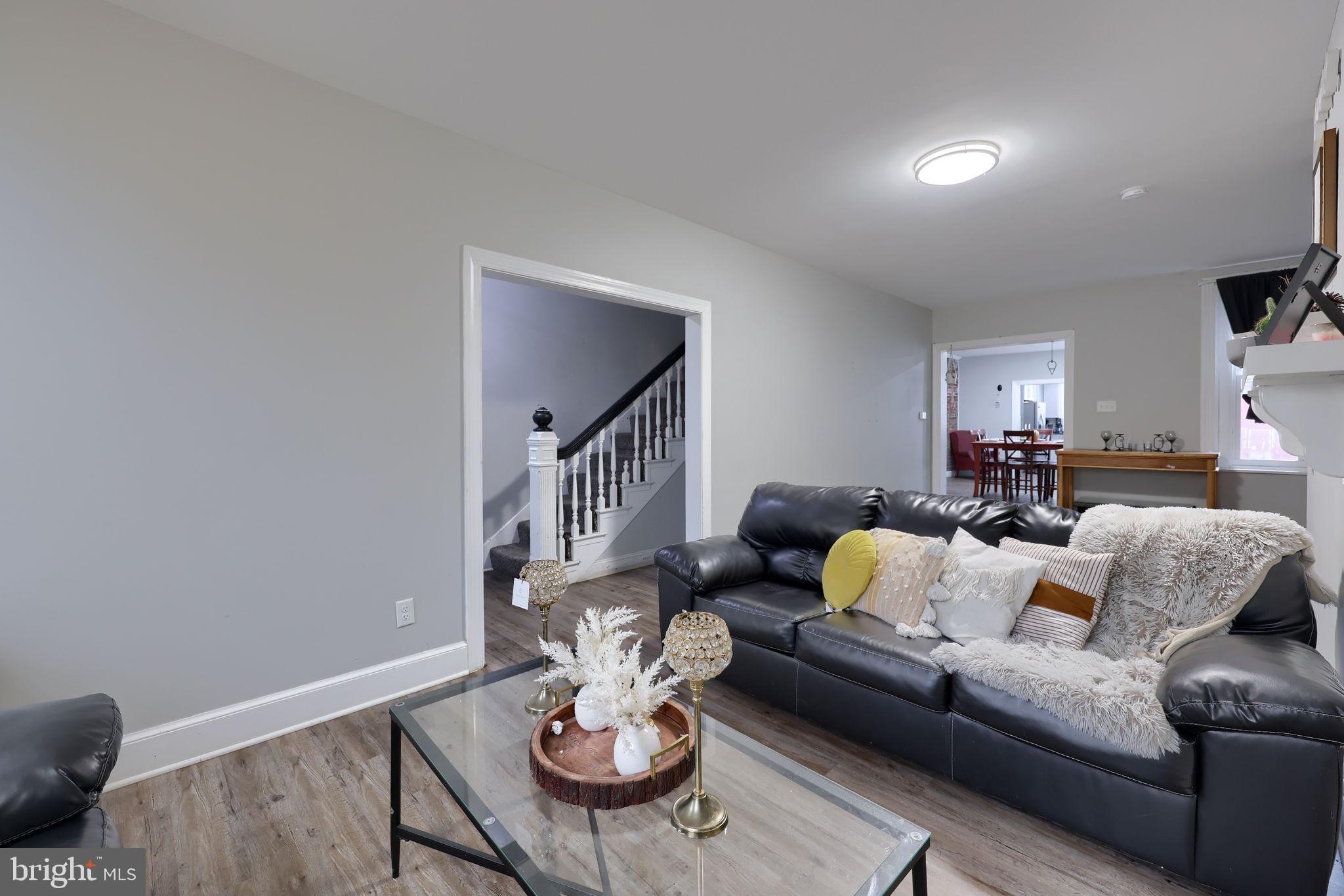 332 Perry Street Columbia, PA 17512 - Photo 3 of 37 a living room with furniture and wooden floor