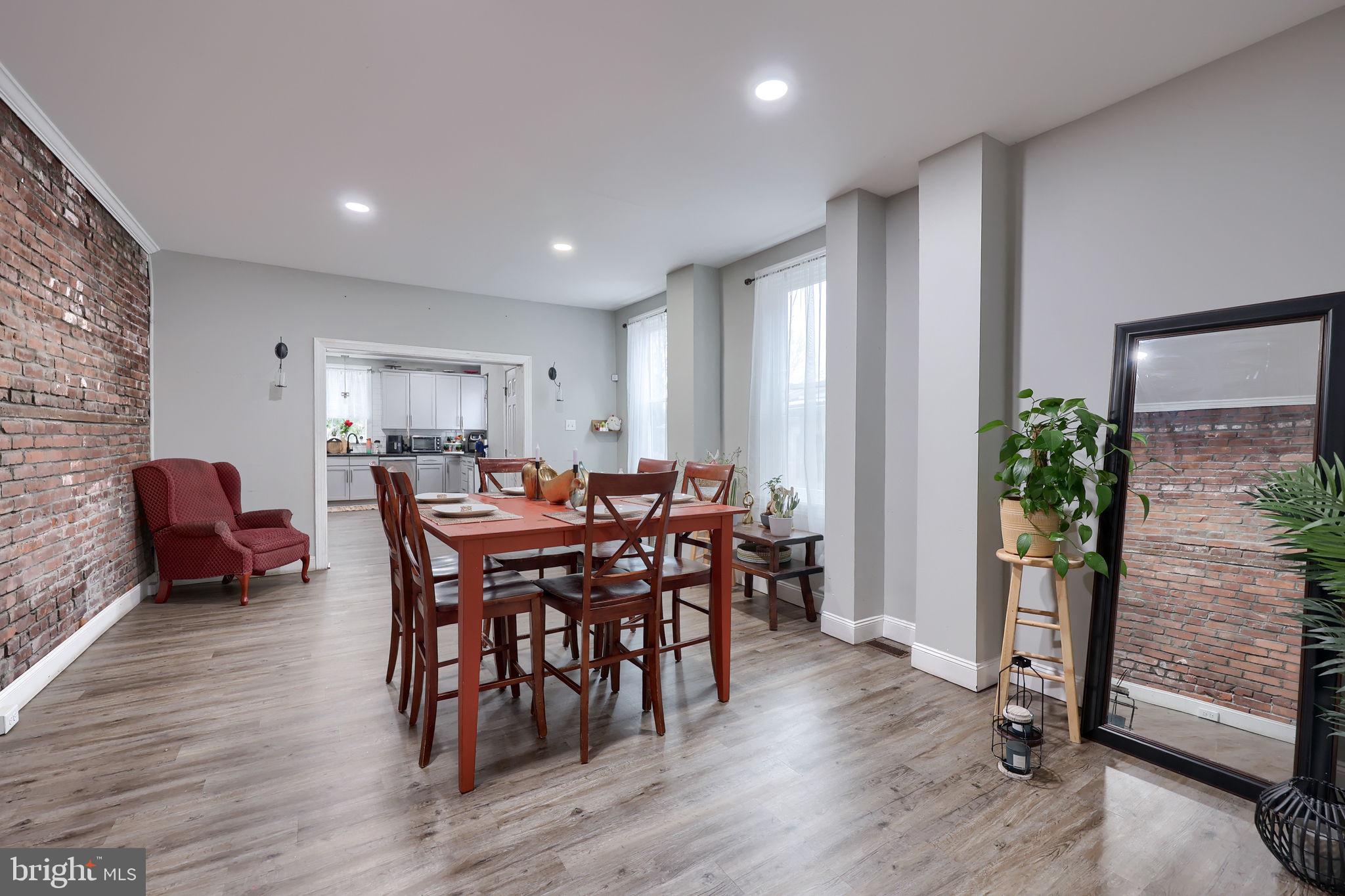 332 Perry Street Columbia, PA 17512 - Photo 8 of 37 a view of a a dining room with furniture window and wooden floor