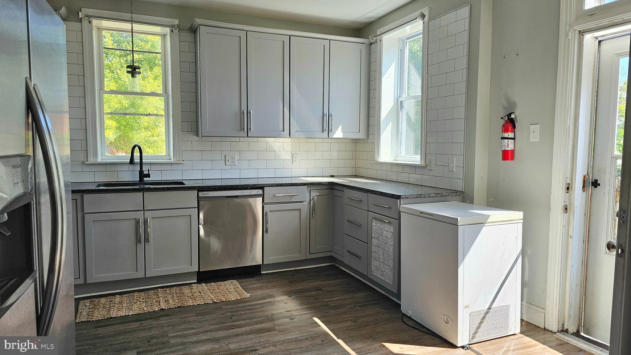 332 Perry Street Columbia, PA 17512 - Photo 8 of 31 a kitchen with a sink cabinets and window