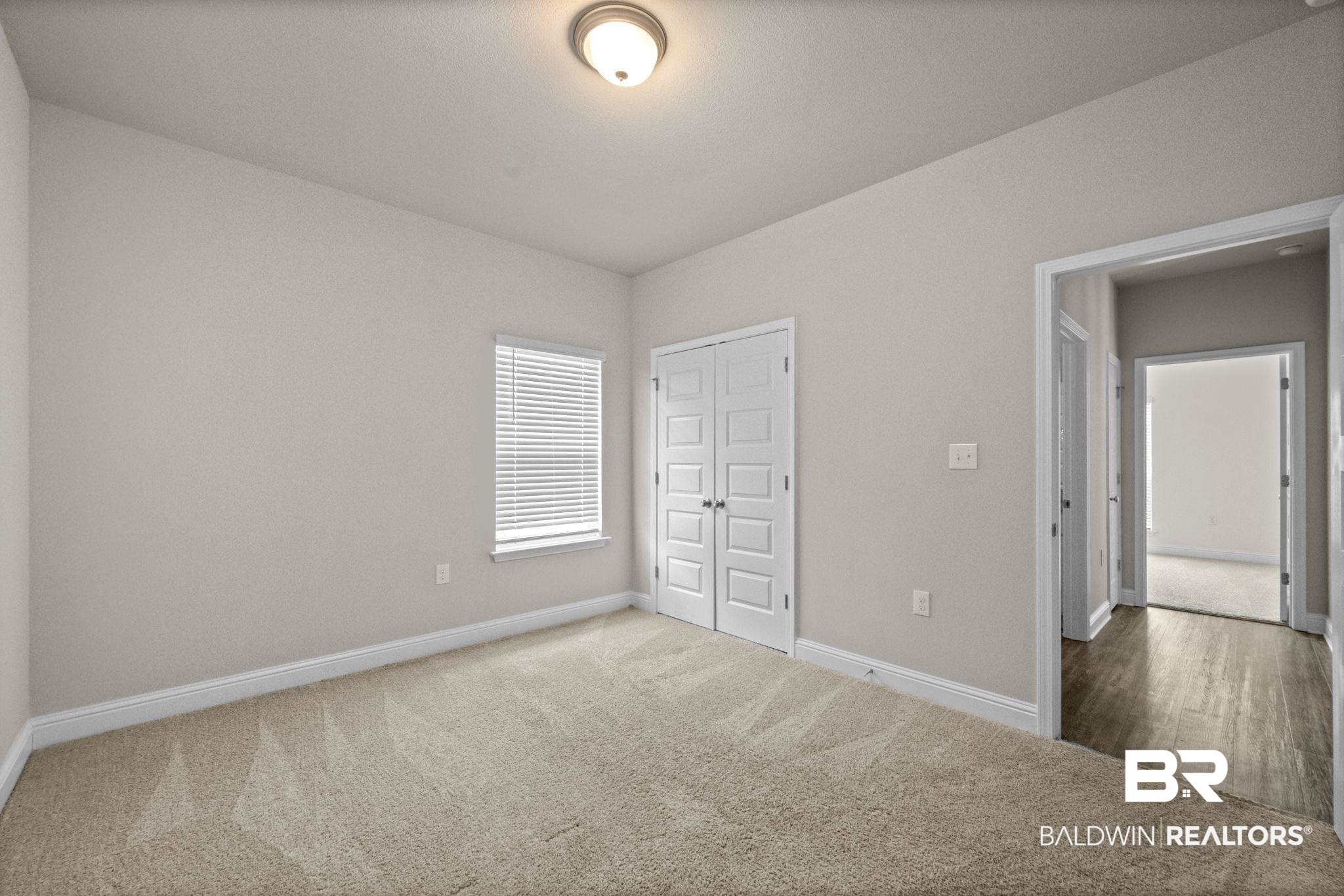 24769 Slater Mill Road Daphne, AL 36526 - Photo 26 of 38 Unfurnished bedroom with carpet flooring and a closet