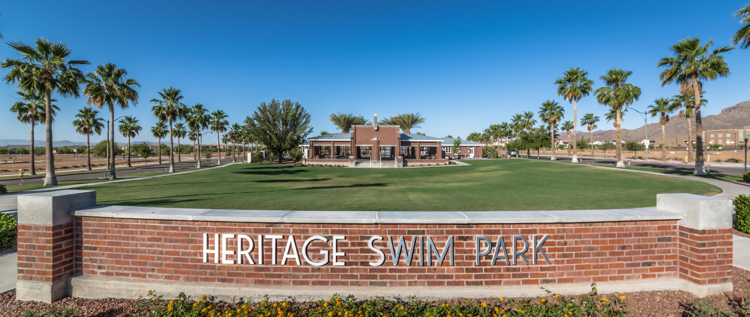2657 North Riley Road Buckeye, AZ 85396 - Photo 25 of 30 a view of a swimming pool with a yard