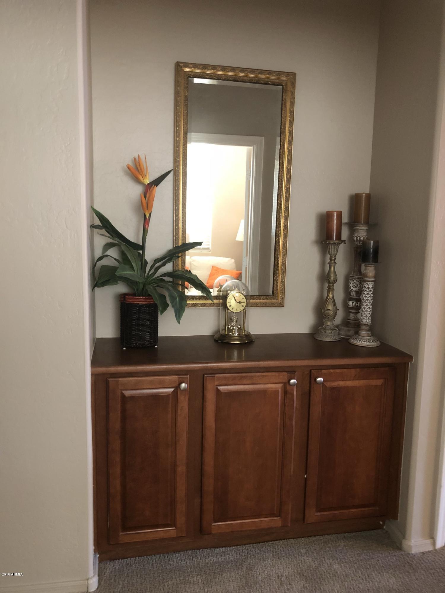 1821 East Beverly Road Phoenix, AZ 85042 - Photo 13 of 16 Beautiful builtin cabinet in hallway