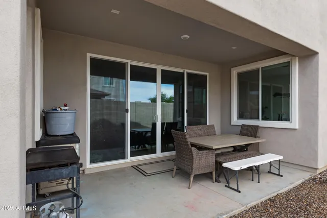 a outdoor living space with furniture and a potted plant