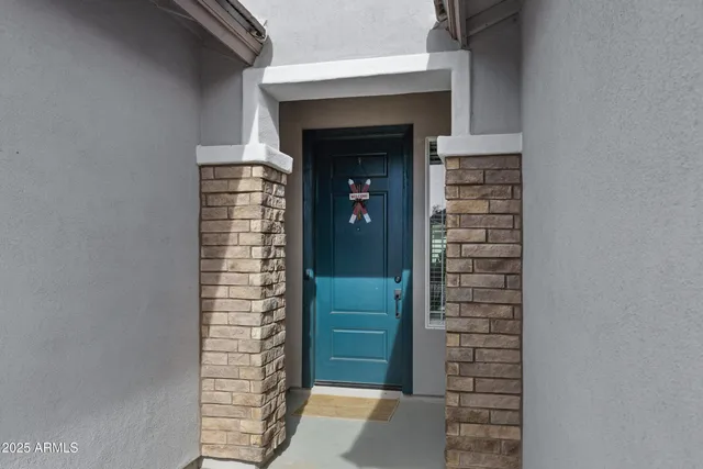 a view of outdoor space and front door