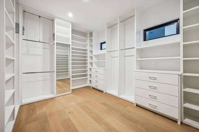 a bathroom with a tub and shower