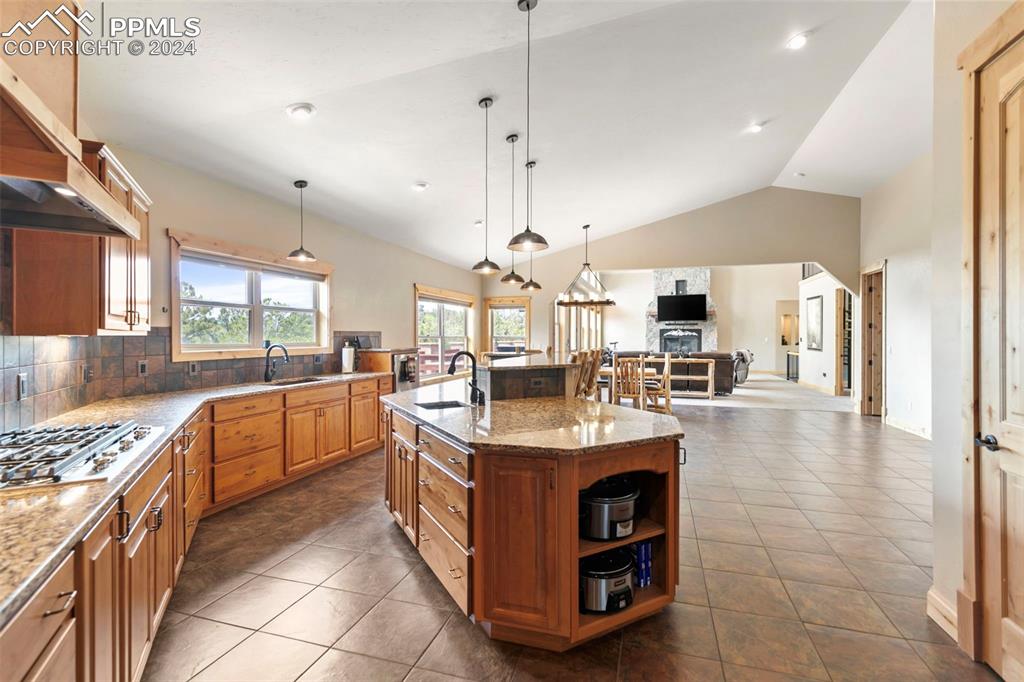 252 Running Elk Point Divide, CO 80814 - Photo 15 of 48 a kitchen with stainless steel appliances granite countertop a sink stove and cabinets