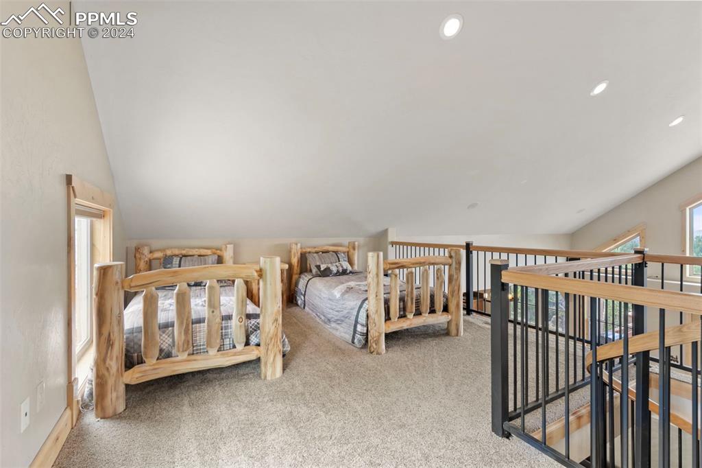 252 Running Elk Point Divide, CO 80814 - Photo 22 of 48 a view of a bedroom with furniture and baby crib