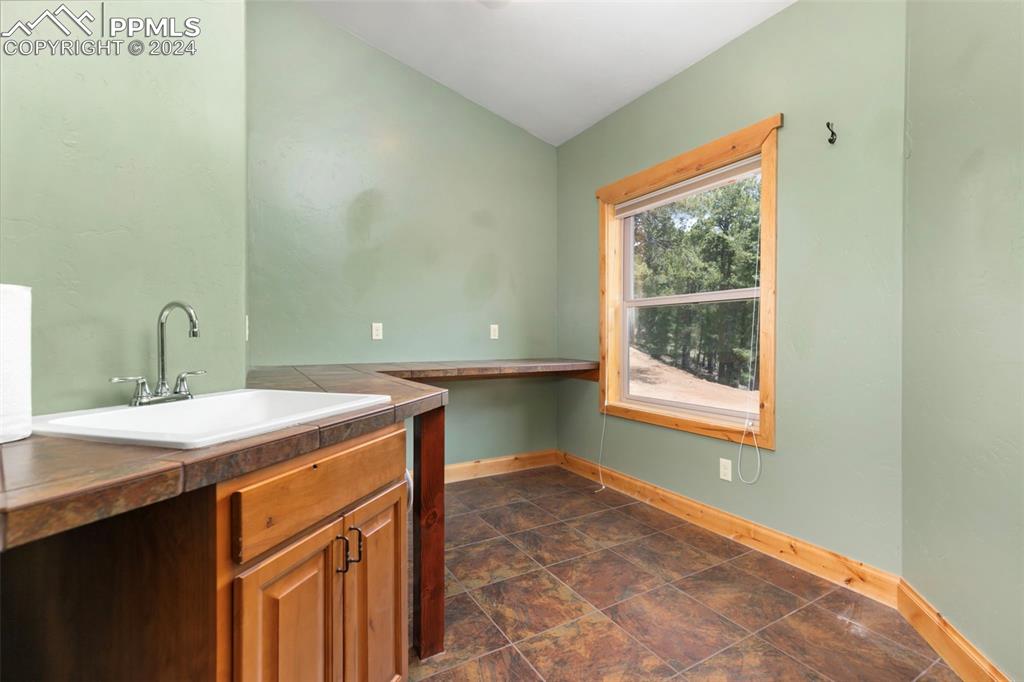 252 Running Elk Point Divide, CO 80814 - Photo 24 of 48 a room with a sink and a window